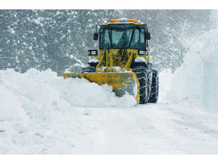 Loader with snow blade