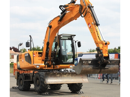 Anti-rollover system on wheeled excavators